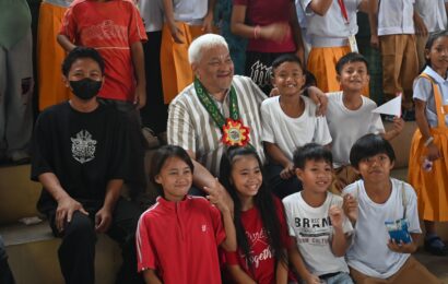Rep. Lazatin inspects multi-purpose buildings, gives cake